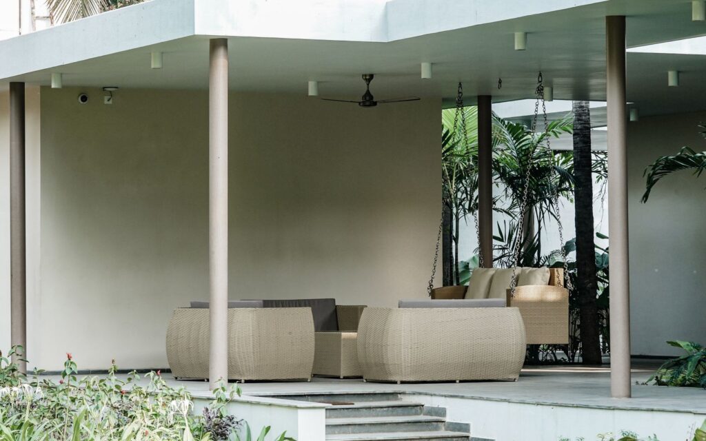 Wicker outdoor sofa set on a patio