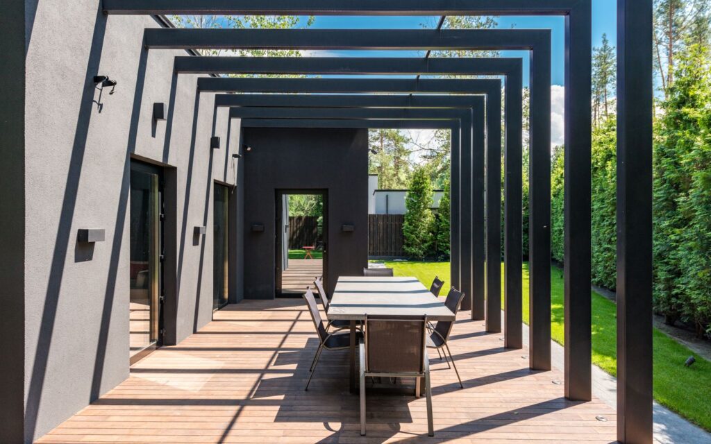 Outdoor dining set under a pergola