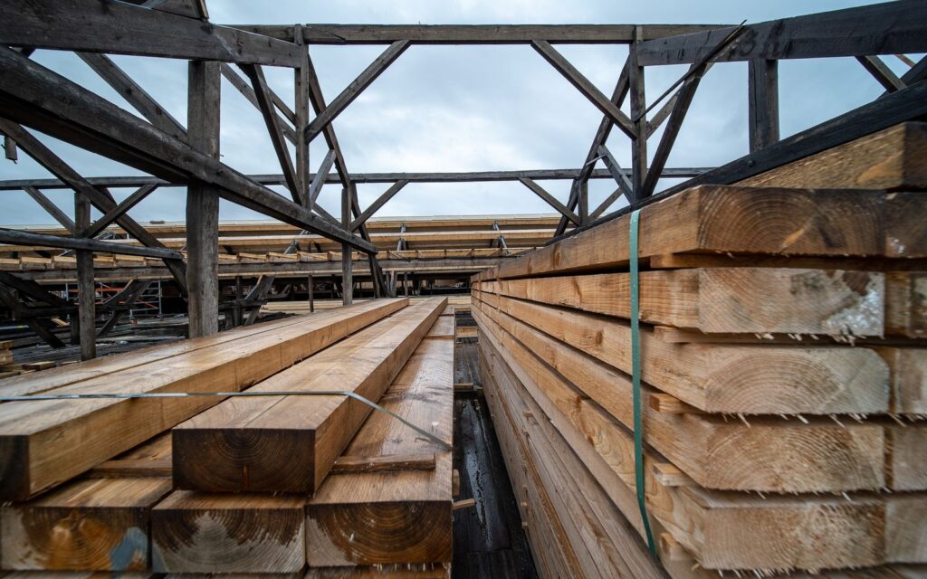 Stacked timber planks for outdoor building