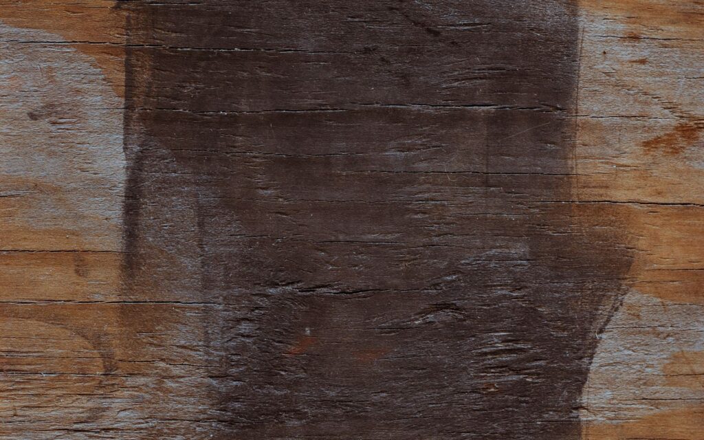 Dark protective stain on timber