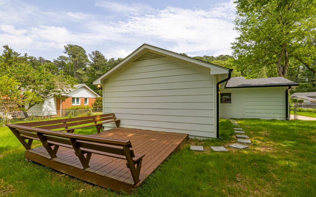 Wooden deck in a sheltered backyard garden