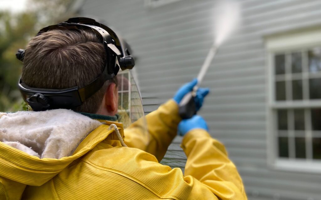 Pressure washing an outdoor surface